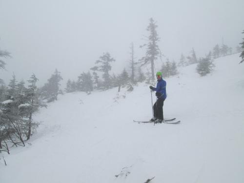 Trees on skiers right of skyward. 